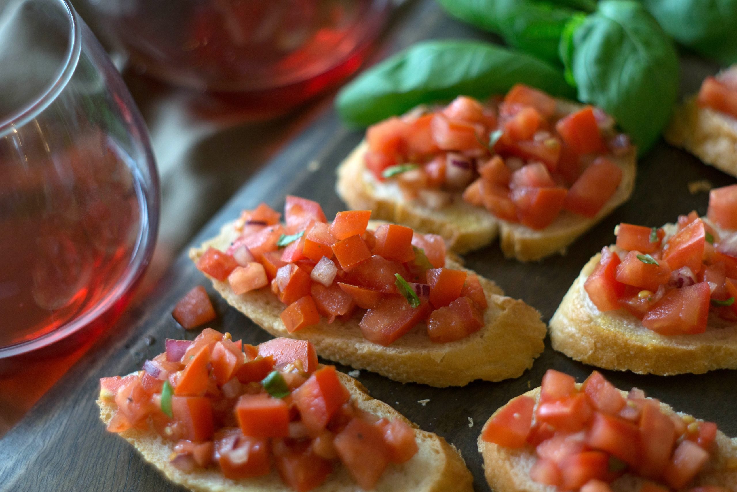 Slices of bread with chopped tomatoes